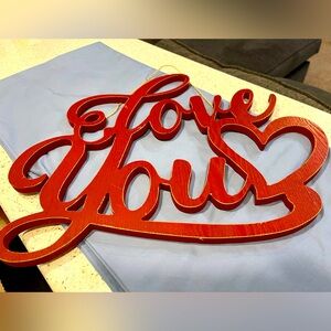 Wooden “LOVE YOU” in Script Sign. Approx 13” x 16” in size (about 1” deep).